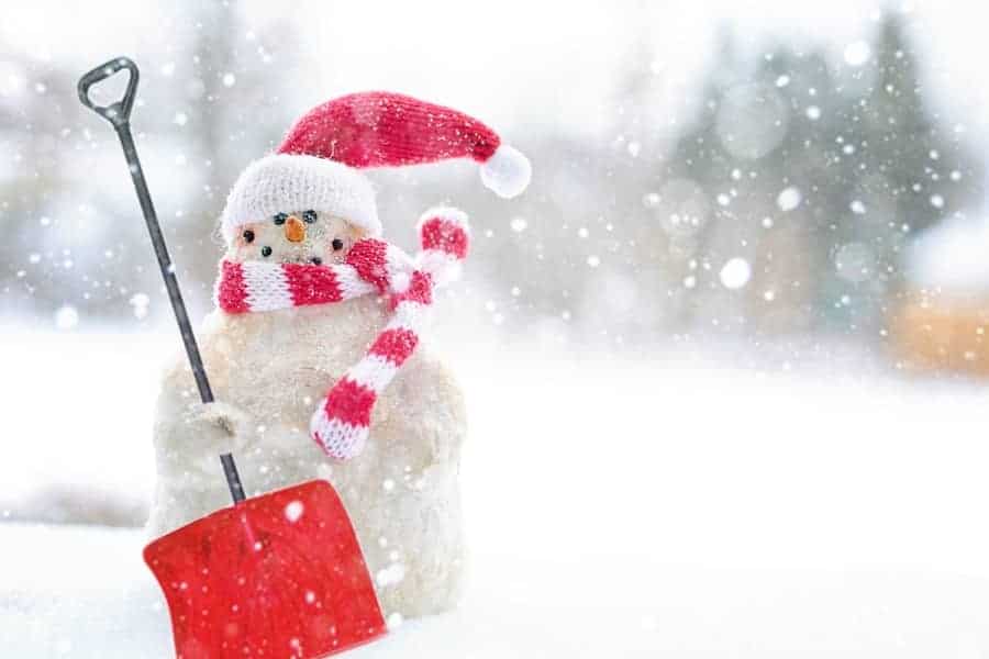 Snowman with Snow shovel representing clear home entry